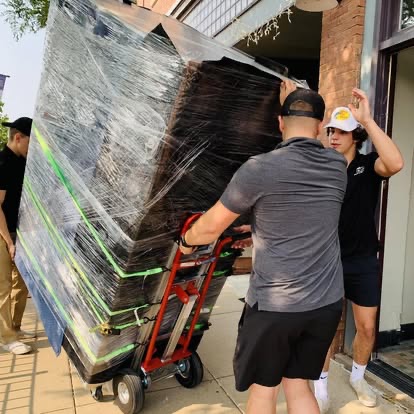 Peak Movers crew handling a move in the Northwoods area