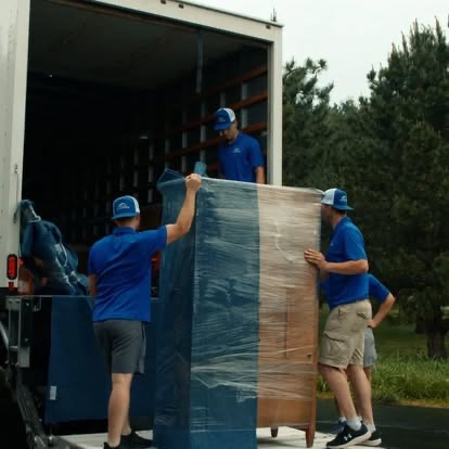 Peak Movers crew loading a moving truck in Northwoods, Wisconsin